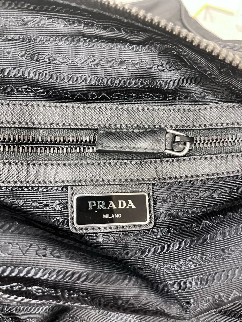PRADA TESSUTO NYLON AND SAFFIANO LEATHER MESSENGER BAG.